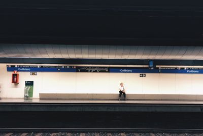 Man walking on railroad station platform