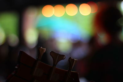 Close-up of illuminated christmas lights on table