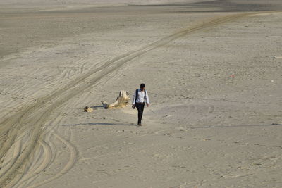 Full length of person walking on land