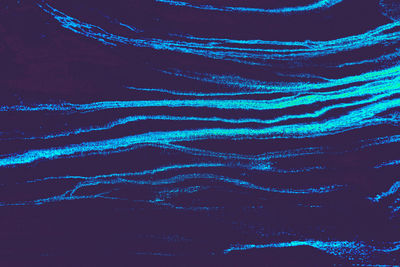 Full frame shot of illuminated blue water