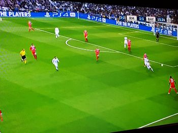 High angle view of people playing soccer on field