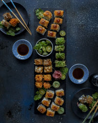 Directly above shot of sushi served in tray on table