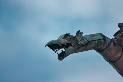 Low angle view of statue against clear sky