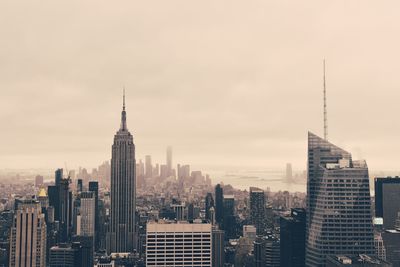 Modern buildings in city against sky