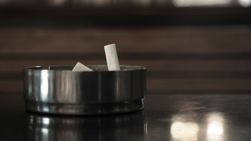 Close-up of beer glass on table