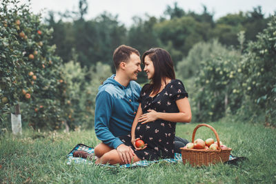 Couple kissing in a basket