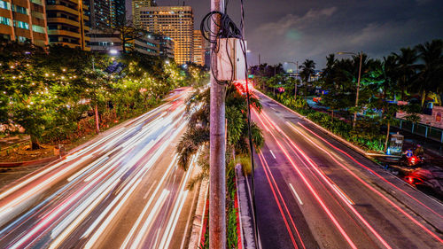 Light trails on city street at night