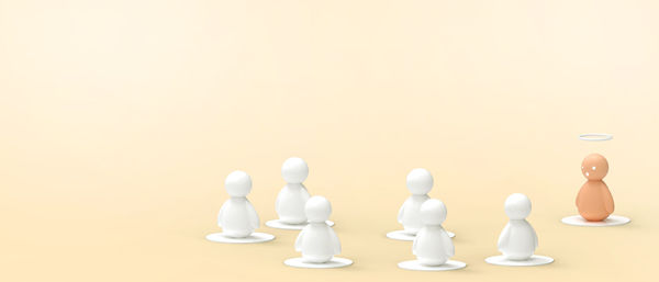 Close-up of chess pieces against white background