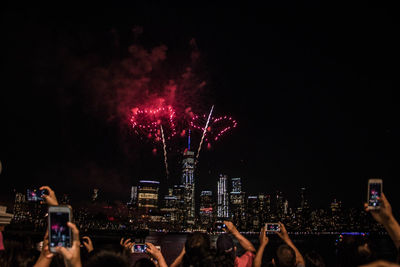 Firework display at night