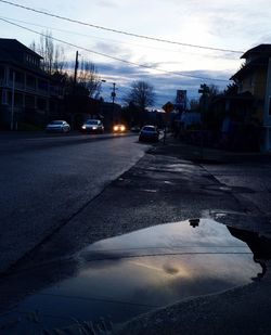 Cars on road in city