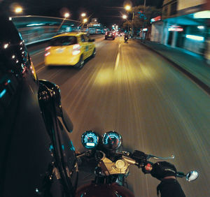 Cars on road at night