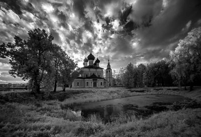 Cathedral against cloudy sky