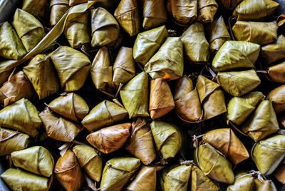 Sticky rice covered in banana leaf