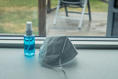 High angle view of bottle on table
