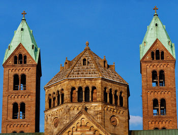 Low angle view of a building against blue sky