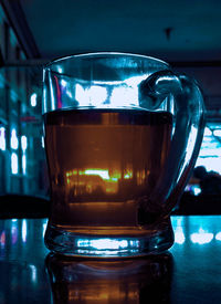 Close-up of coffee cup on table