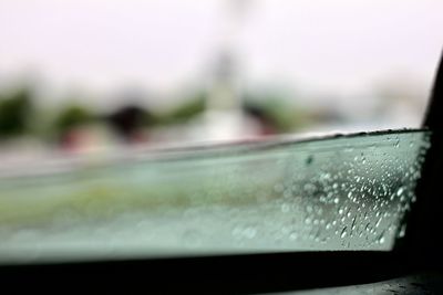Close-up of water drops on glass window