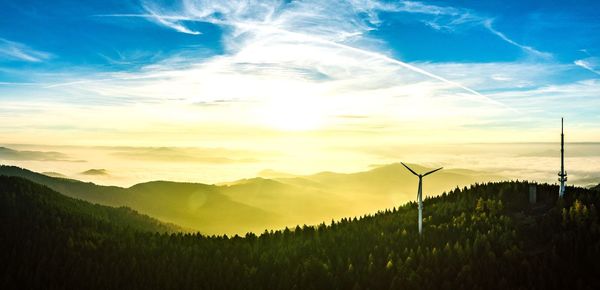 Scenic view of landscape against sky during sunset