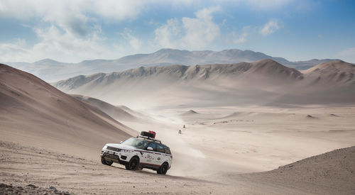 Scenic view of desert against sky