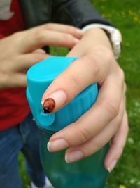 Close-up of woman holding hands