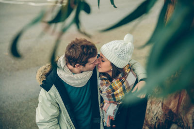 Young couple standing outdoors