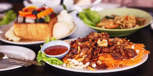 Close-up of food served on table