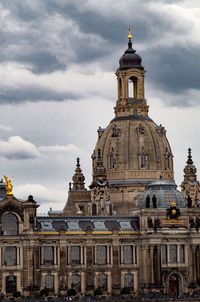 View of buildings in city against sky