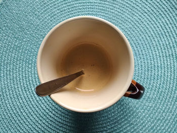 High angle view of coffee cup on table