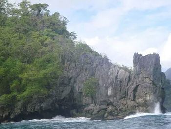 Scenic view of rock formation in sea