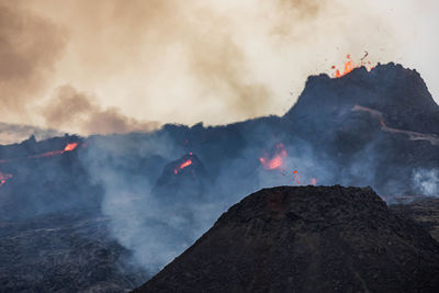 Panoramic view of volcanic mountain against sky