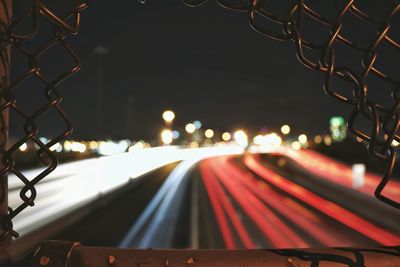 Close-up of light trails in city at night