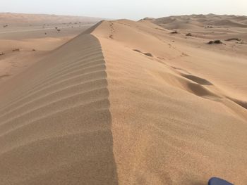 Scenic view of desert against sky