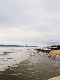 Scenic view of beach against sky