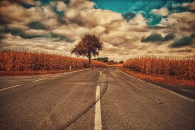 Road against sky during sunset