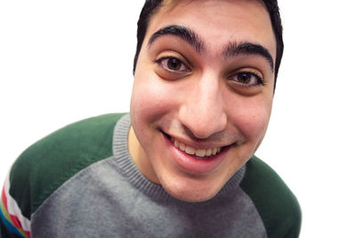 Portrait of smiling man against white background