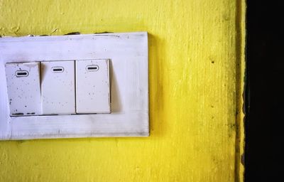 Close-up of old yellow wall