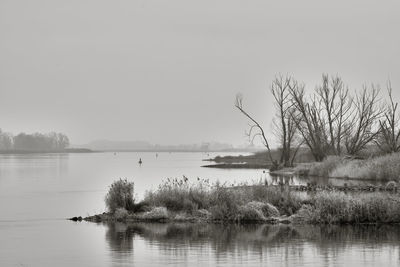 Scenic view of lake against clear sky