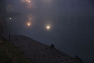 Scenic view of landscape against sky at dusk