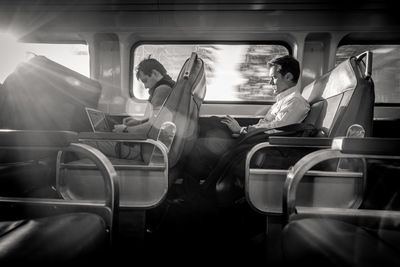 Woman sitting in train