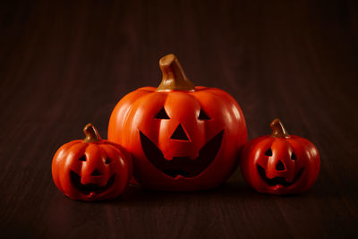 Pumpkin on table against black background