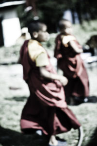 Young woman standing in park