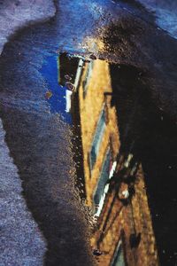 High angle view of puddle on street