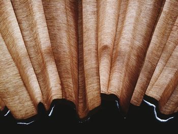 High angle view of brown curtain on table