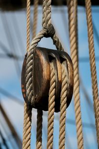 Close-up of rope tied to bollard