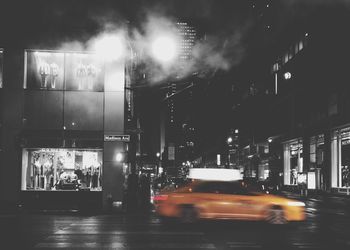 Illuminated street light at night