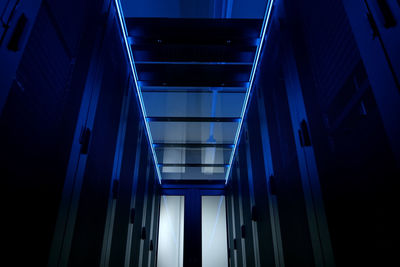 Low angle view of illuminated staircase in building