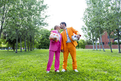 Full length of mother and daughter in park