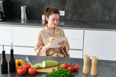 Young woman using mobile phone