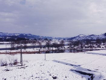 Scenic view of snow covered landscape