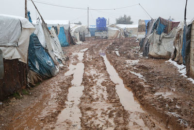 Syrian refugee tents covered with heavy snow.